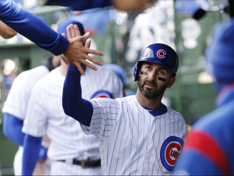 Daniel Descalso #3 of the Chicago Cubs celebrates after he scored on the triple by Anthony Rizzo #44 of the Chicago Cubs during the fourth inning of a game against the Arizona Diamondbacks at Wrigley Field on April 19, 2019 in Chicago, Illinois. (Photo by Nuccio DiNuzzo/Getty Images)
