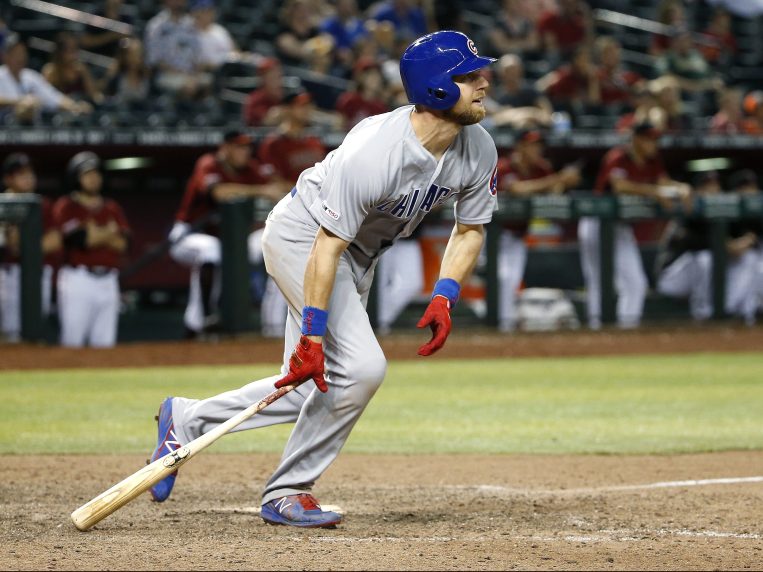 Chicago Cubs' Ben Zobrist watches the flight of the ball as he hits an RBI double against the Arizona Diamondbacks during the fifteenth inning of a baseball game, Sunday, April 28, 2019, in Phoenix. (AP Photo/Ralph Freso)
