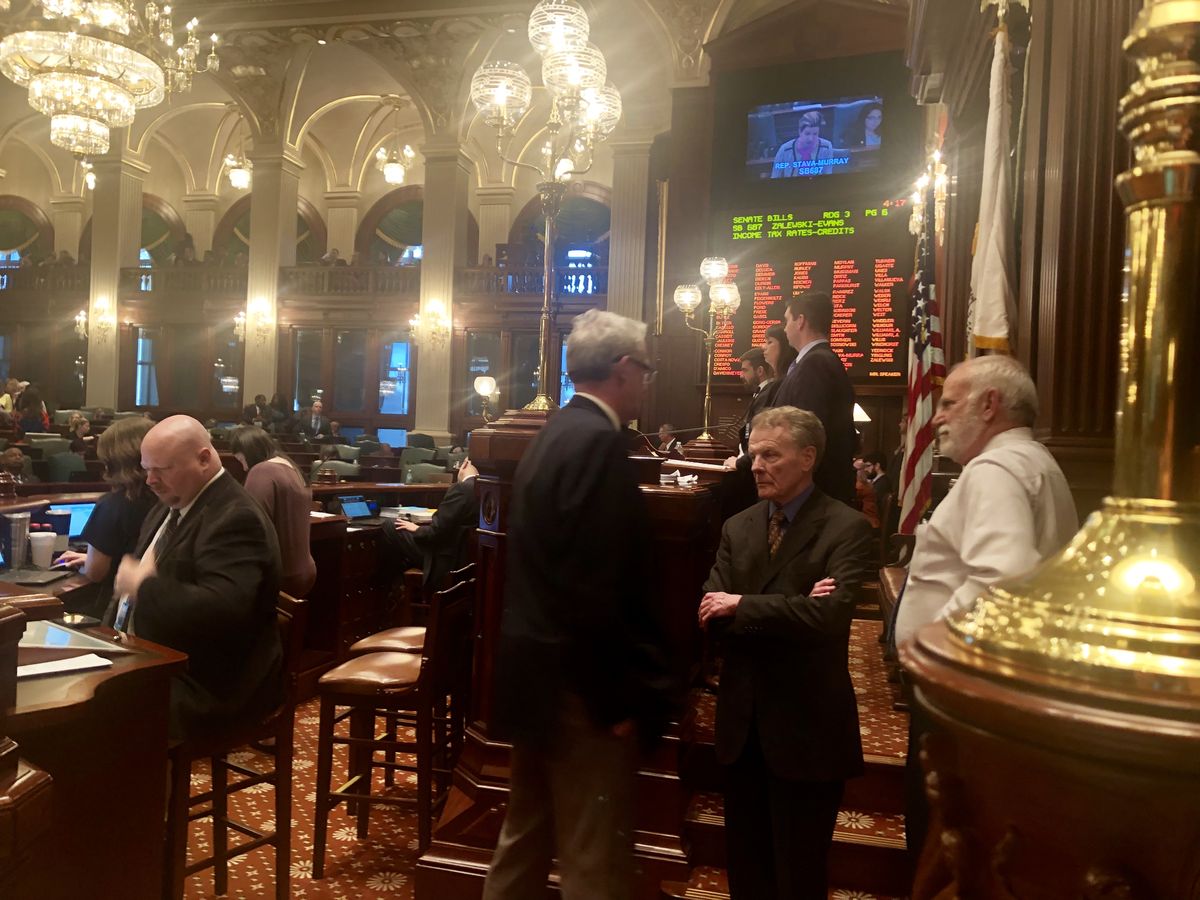 House Republican Leader Jim Durkin and House Speaker Mike Madigan talk on the House floor