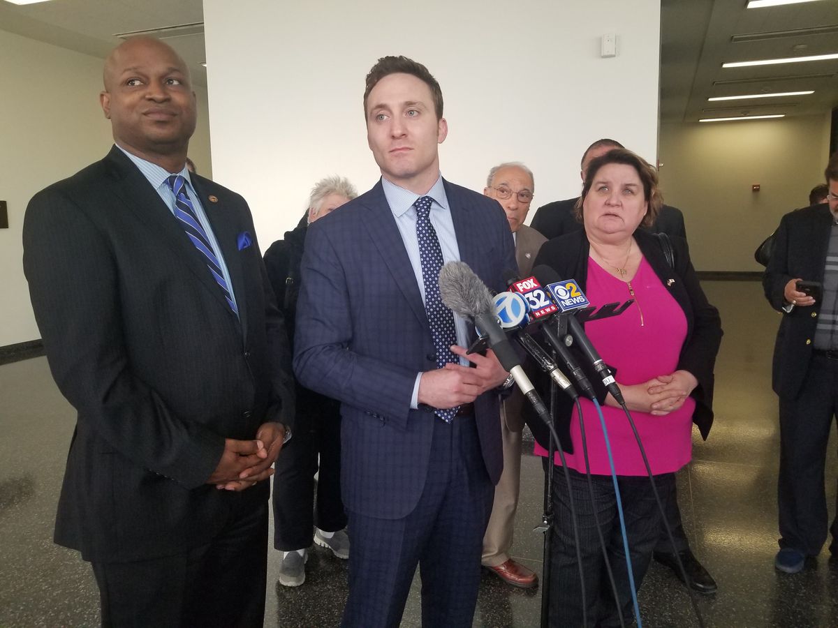 State Rep. Emanuel “Chris” Welch, D-Westchester, attorney Ari Scharg and state Rep. Kathleen Willis, D-Northlake, outside a courtroom on April, 16, 2019.