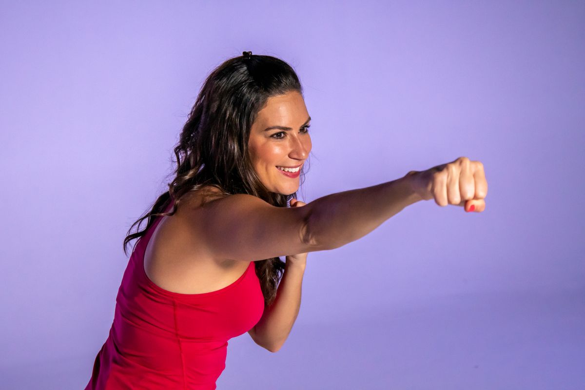 Health and fitness expert Stephanie Mansour throws a jab during kickboxing exercises. | Brian Ernst/Sun-Times