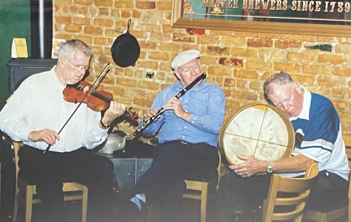 Malachy Towey (right, on bodhran) and flautist friend Kevin Henry and fiddler Frank Burke.