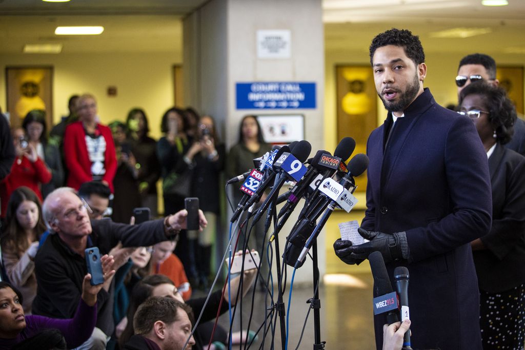 Jussie Smollett speaks to reporters after all charges against him were dropped in 2019.