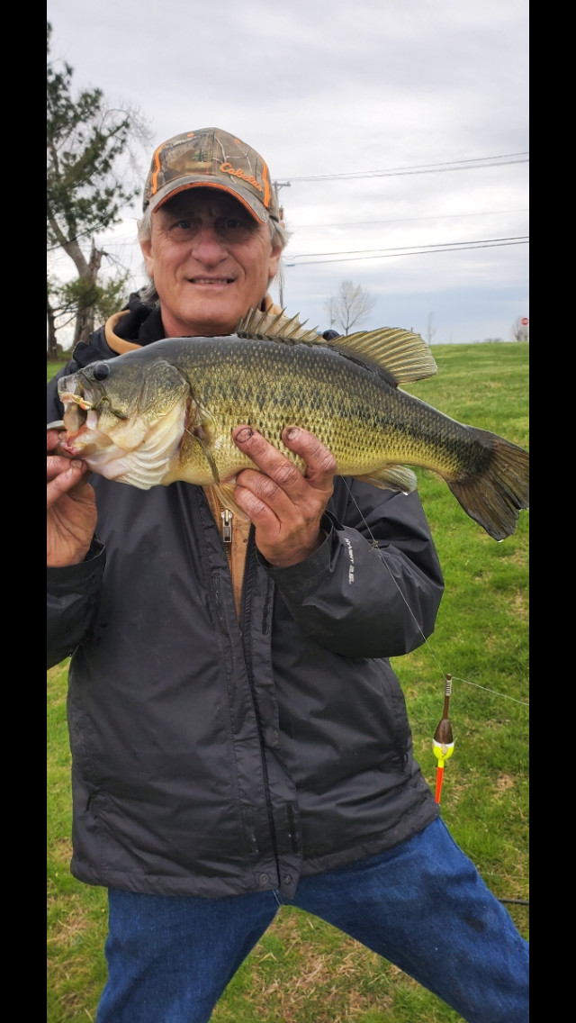 Brian Dore with a big largemouth bass that also caught a panfish. Provided photo