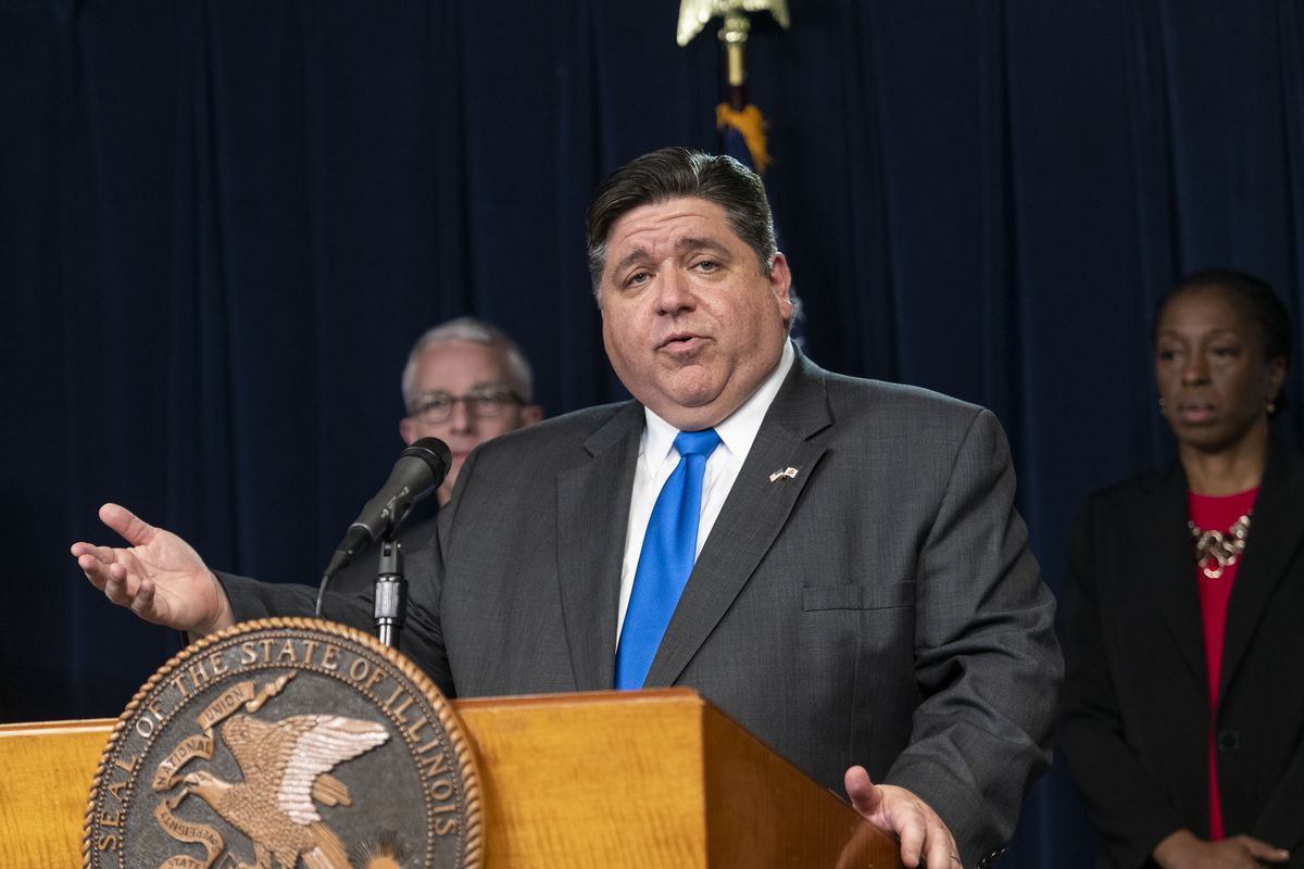 Gov. J.B. Pritzker at a daily briefing last month.