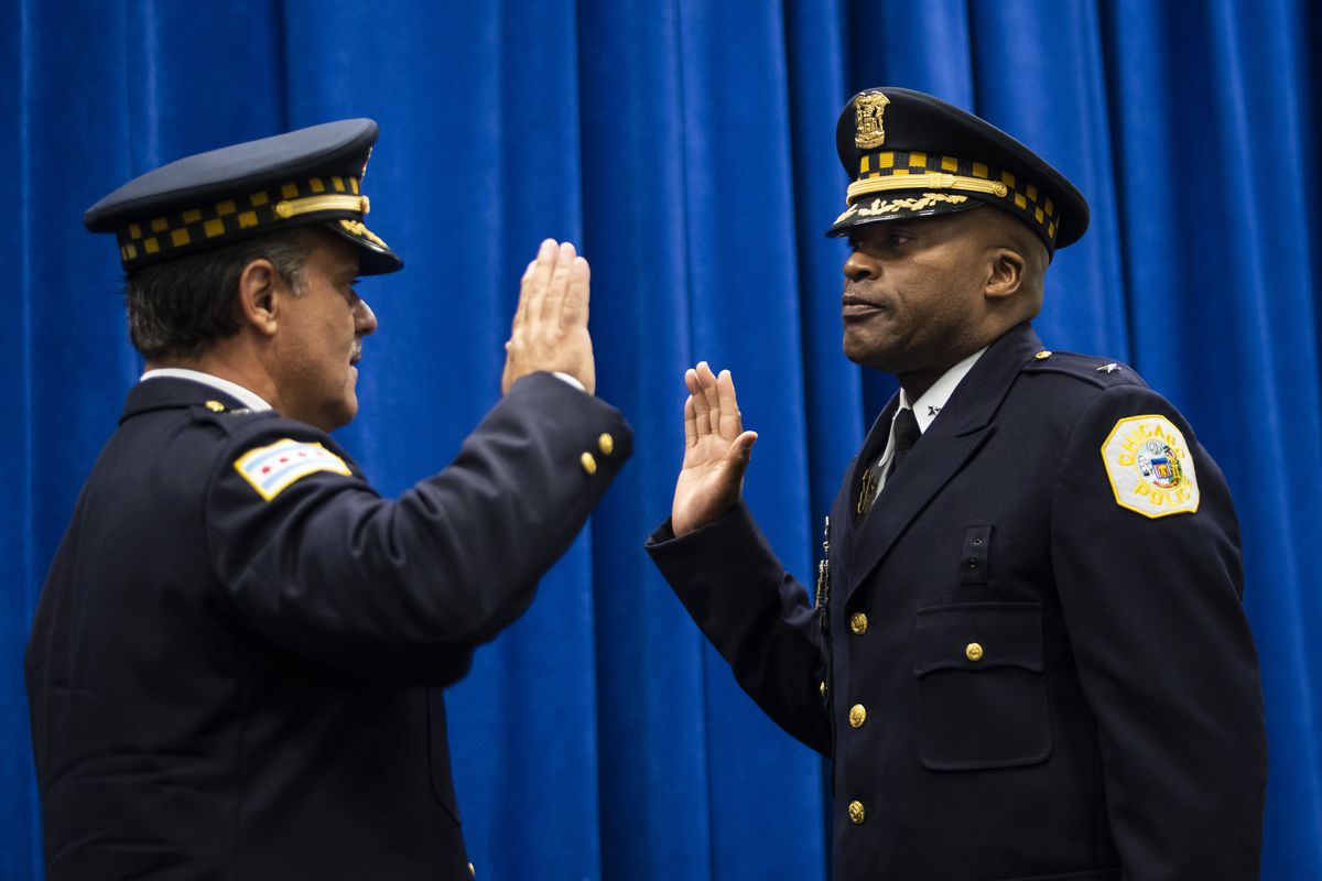 Newly-promoted CPD Deputy Chief of Criminal Networks Dion Boyd (right) was sworn in during a promotion ceremony at CPD headquarters by retiring First Deputy Supt. Anthony Riccio on July 15.