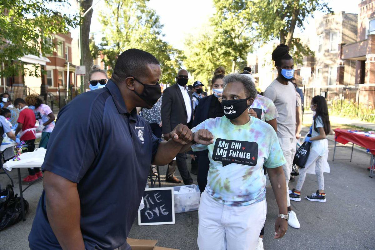 Mayor Lori Lightfoot walking around and greeting residents — in a pandemic-approved way — at a block party Friday, Sept. 4, 2020 in the 1000 block of North Monticello Avenue in Humboldt Park.